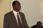 Kenyan Minister of Public Service speaking at AMDIN Regional workshop